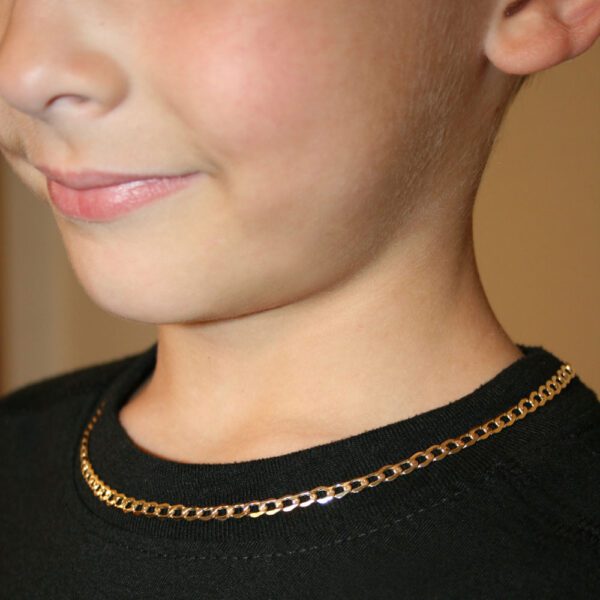 boys gold chain necklace closeup