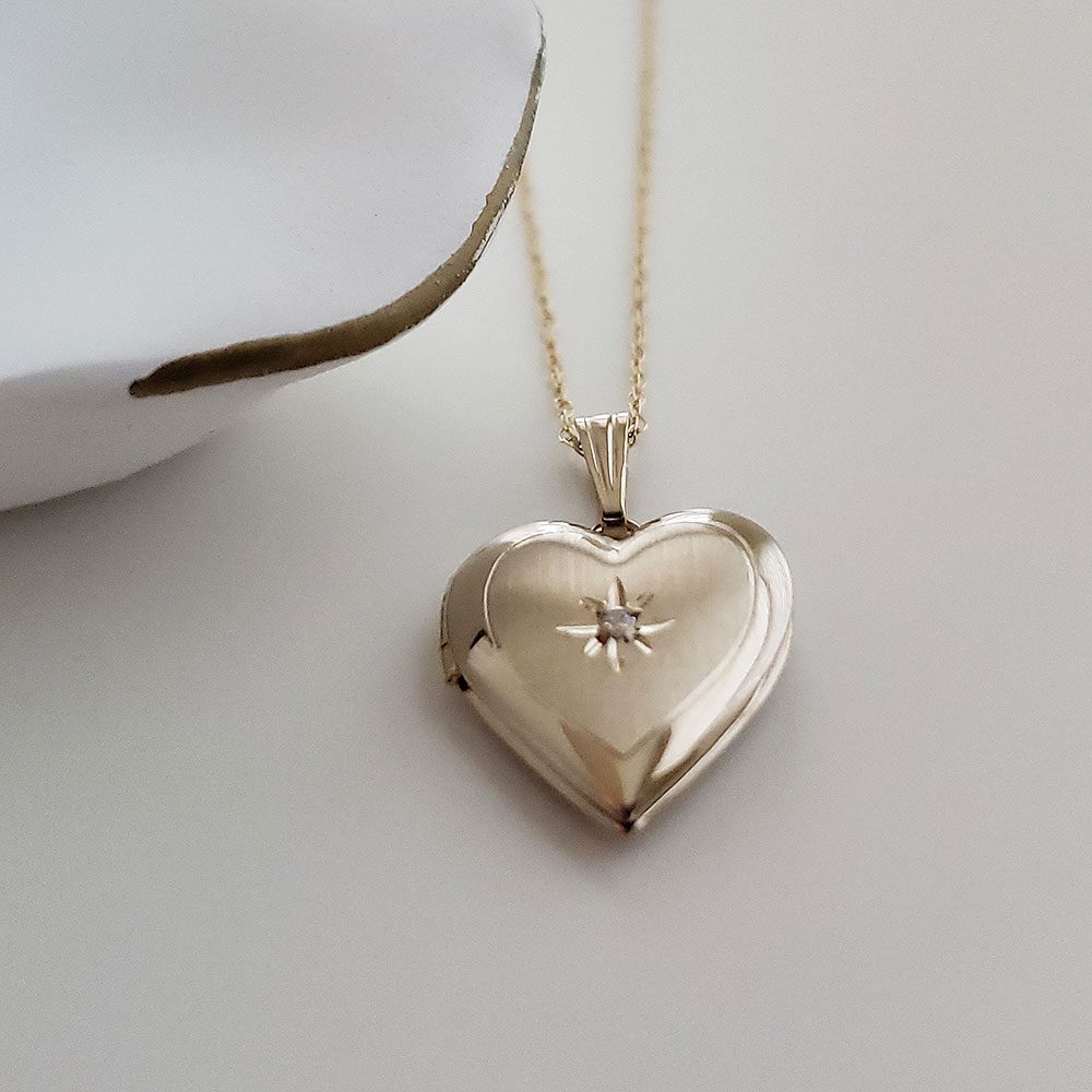 Diamond heart locket for baby and child.