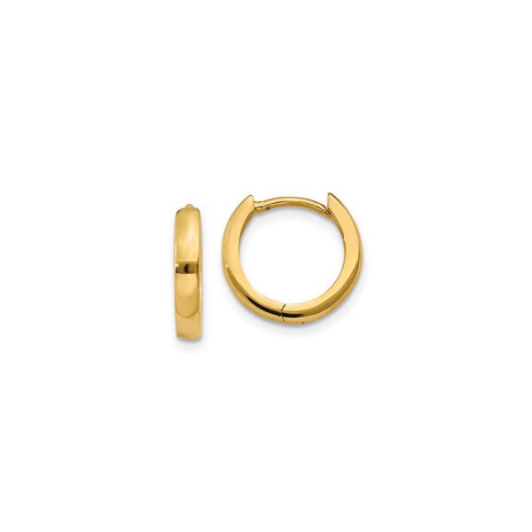 Gold huggie hoop earrings.