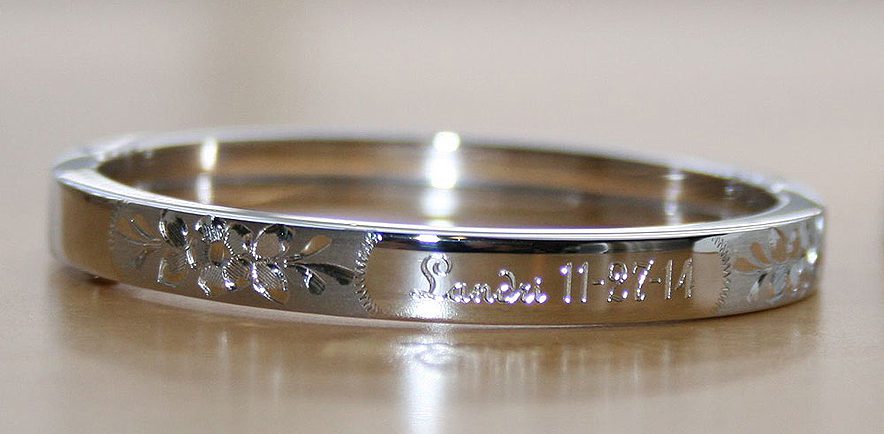 Silver engravable baby bangle bracelet.