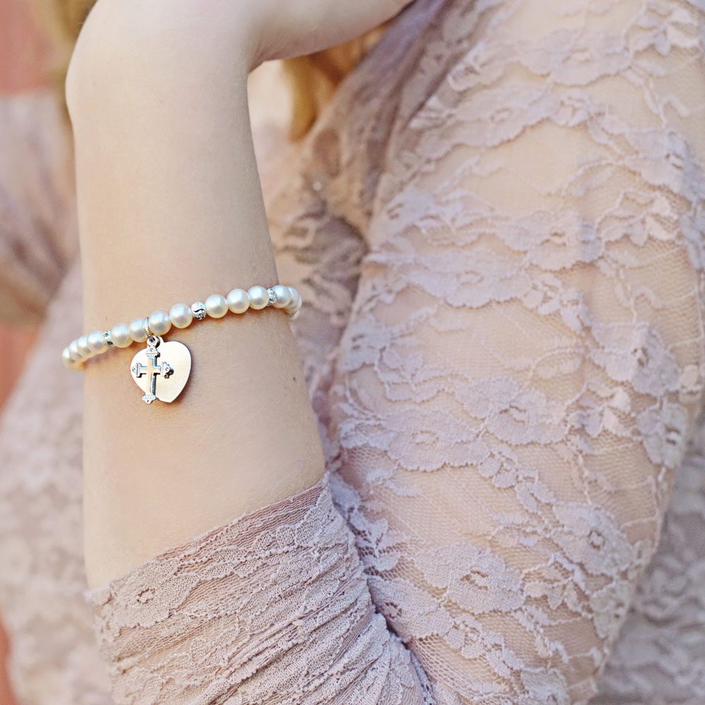 First holy communion bracelet with pearls.