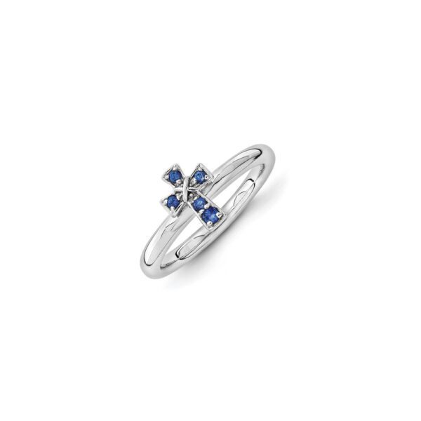 Girls birthstone cross ring in blue sapphire.