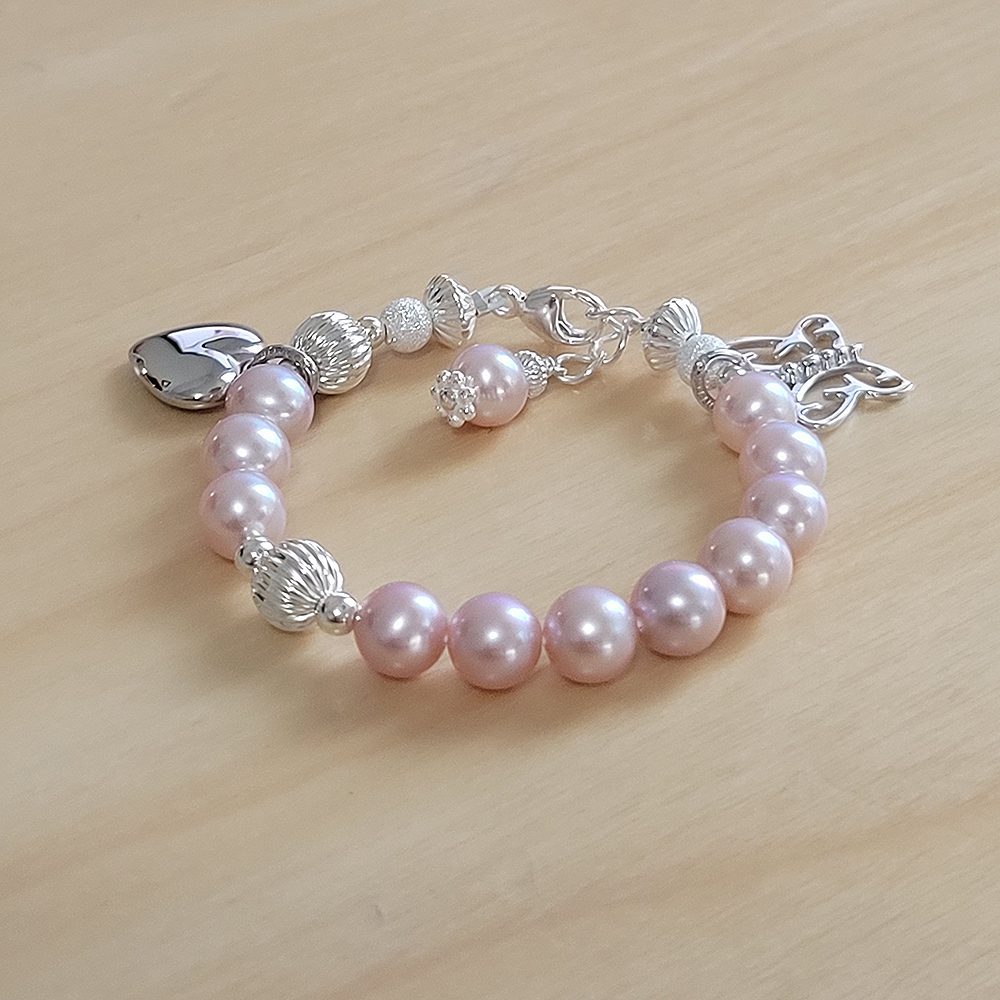 Pink Rosary Christening bracelet.