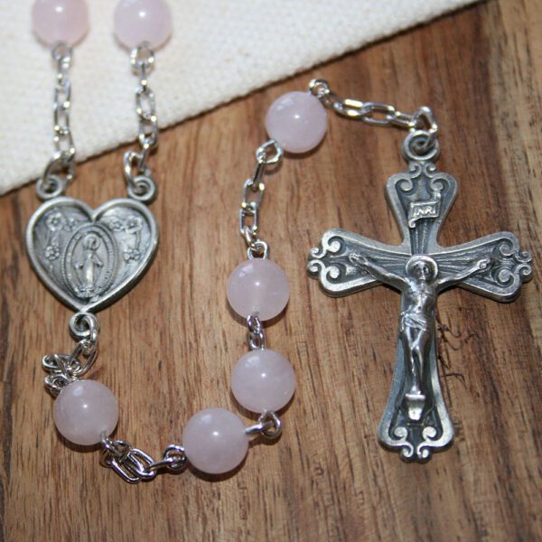 Sterling silver pink quartz communion rosary for girls.