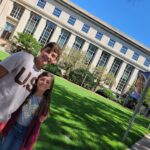 Alex and Katie standing on the MIT campus during a college visit, symbolizing the rewards of intentional, educationally focused parenting.
