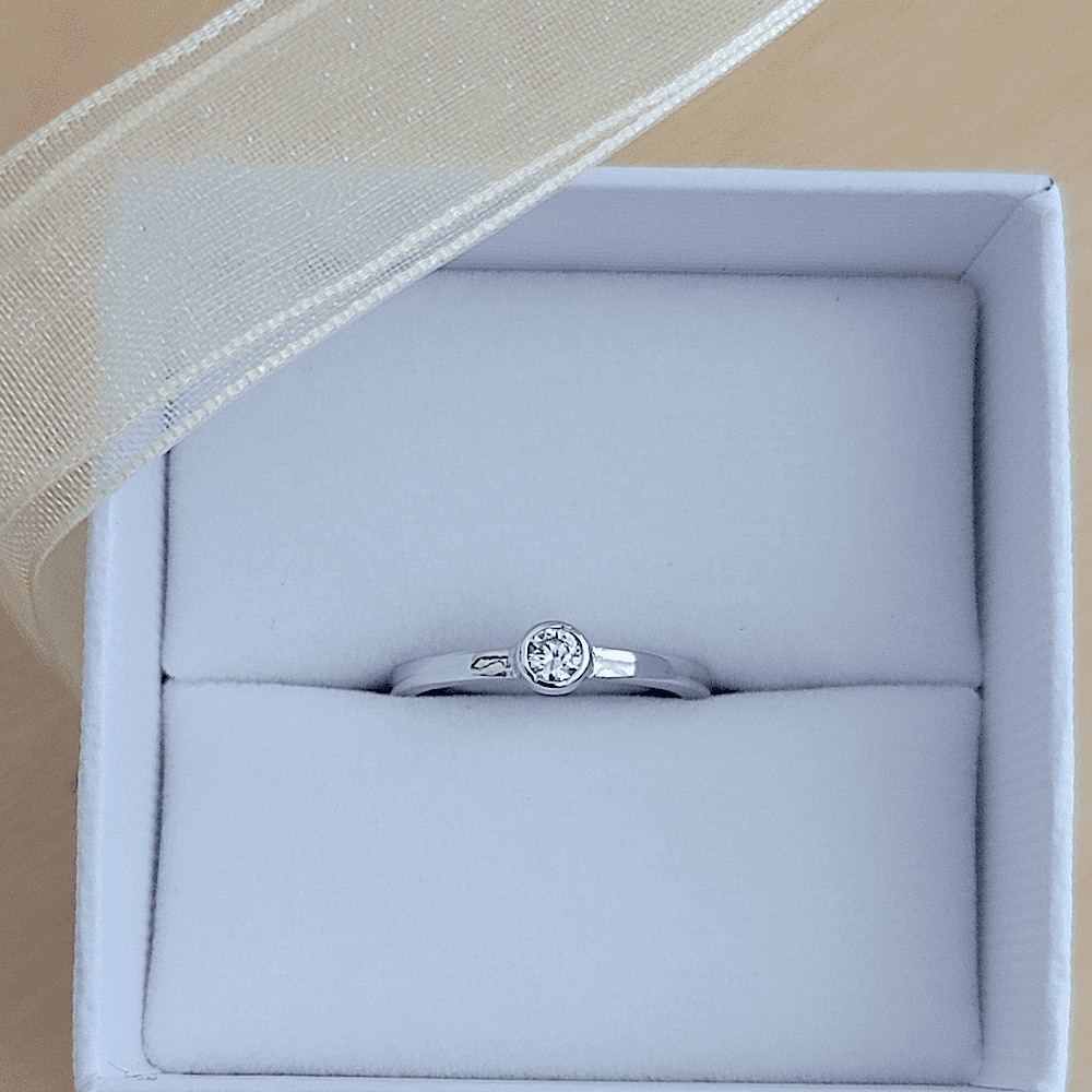 Sterling silver diamond cz baby ring in sizes 1, 2, 3, 4, and 5